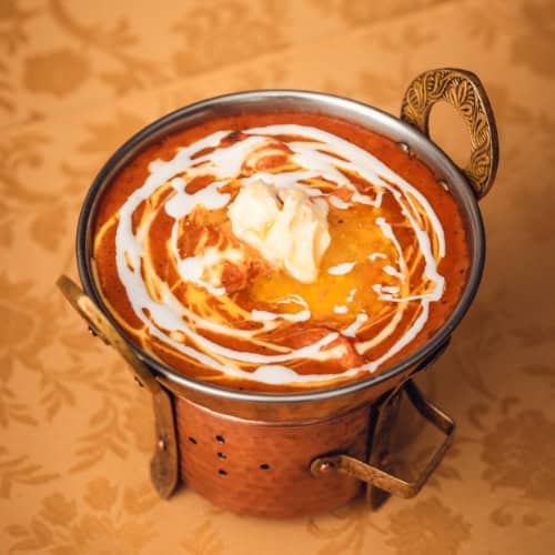 Frango com Manteiga - Restaurante Indiano em Lisboa Frango com Manteiga, um caril cremoso, servido no nosso restaurante halal em Lisboa.