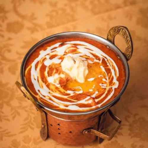 Butter Chicken - Best Indian Lunch in Lisbon Butter chicken, a creamy Indian curry, perfect for lunch in Lisbon.
